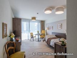 Pflegezimmer mit Pflegebett